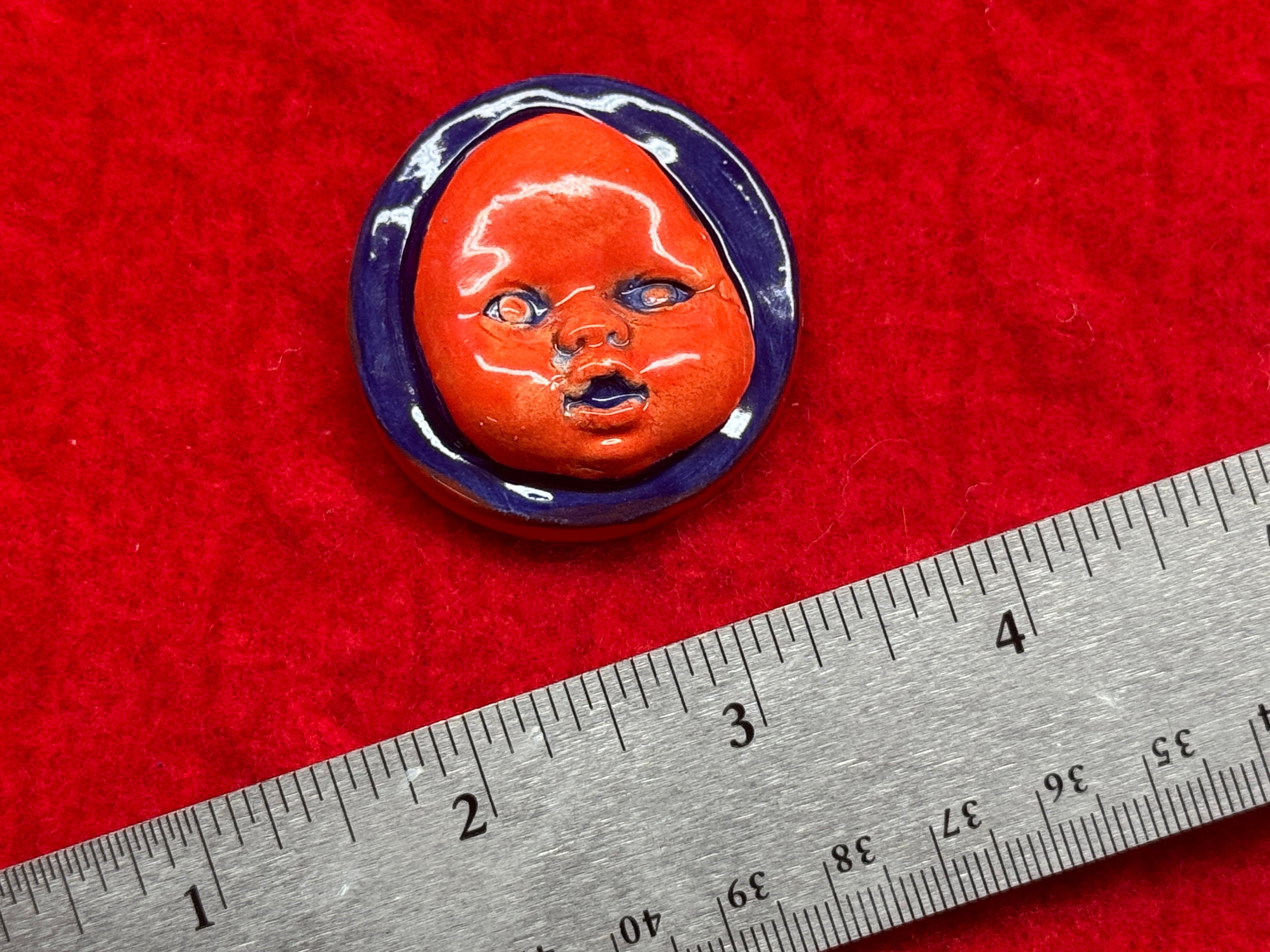 baby face magnet - blue & red