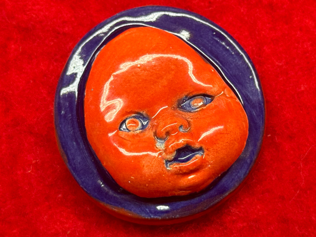 baby face magnet - blue & red