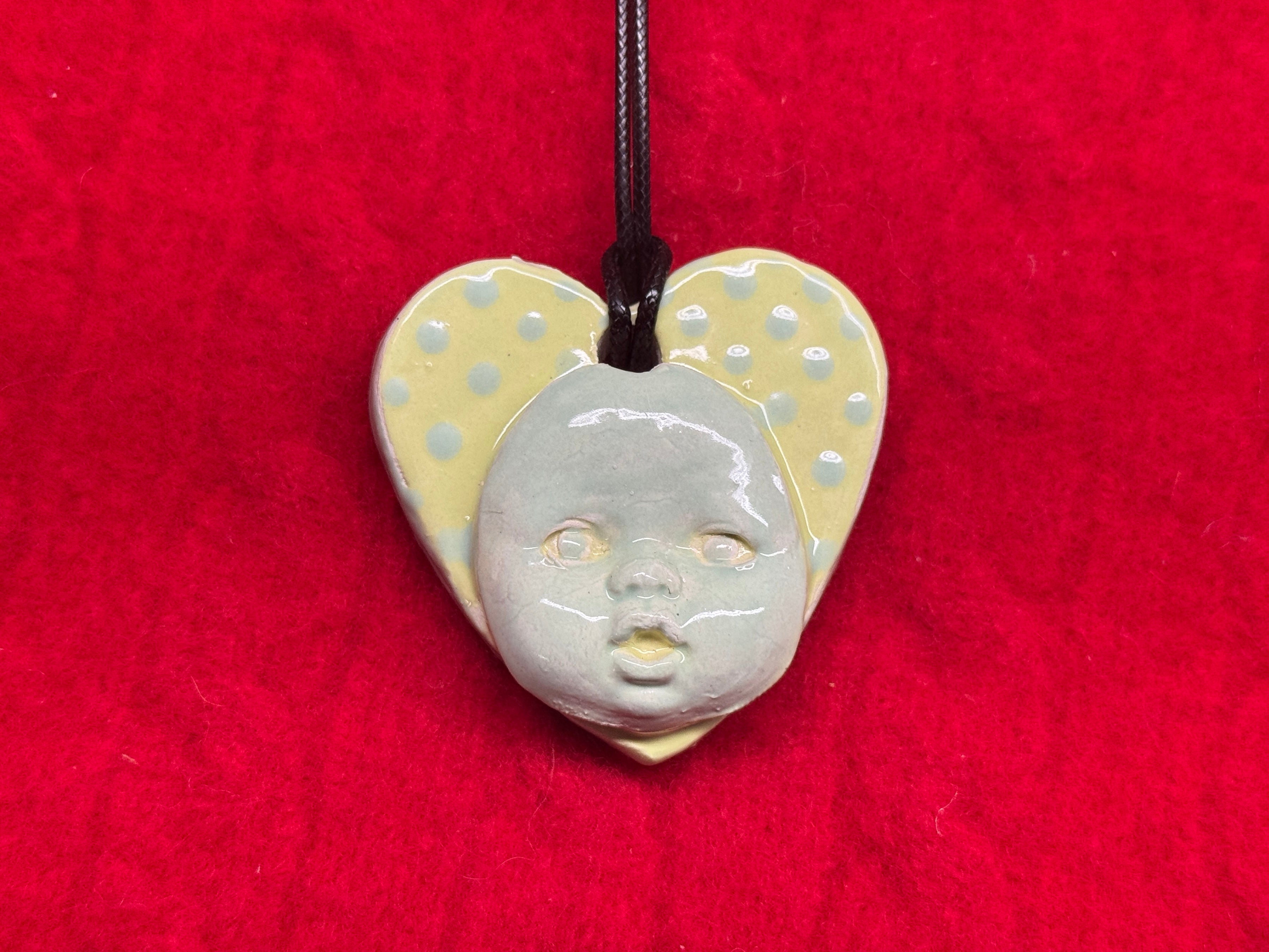 baby face necklace - pastel blue & green