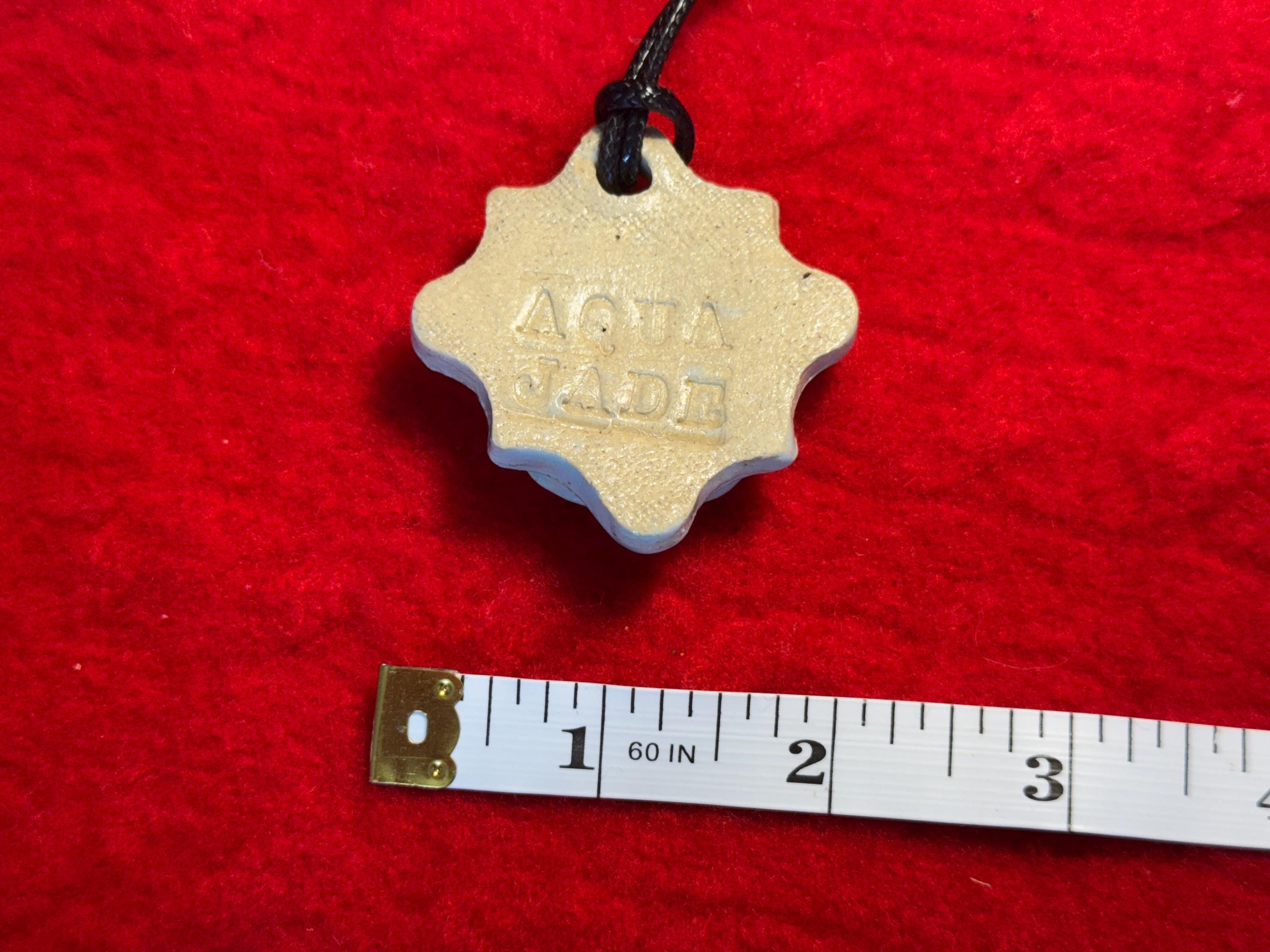 baby face necklace - baby blue