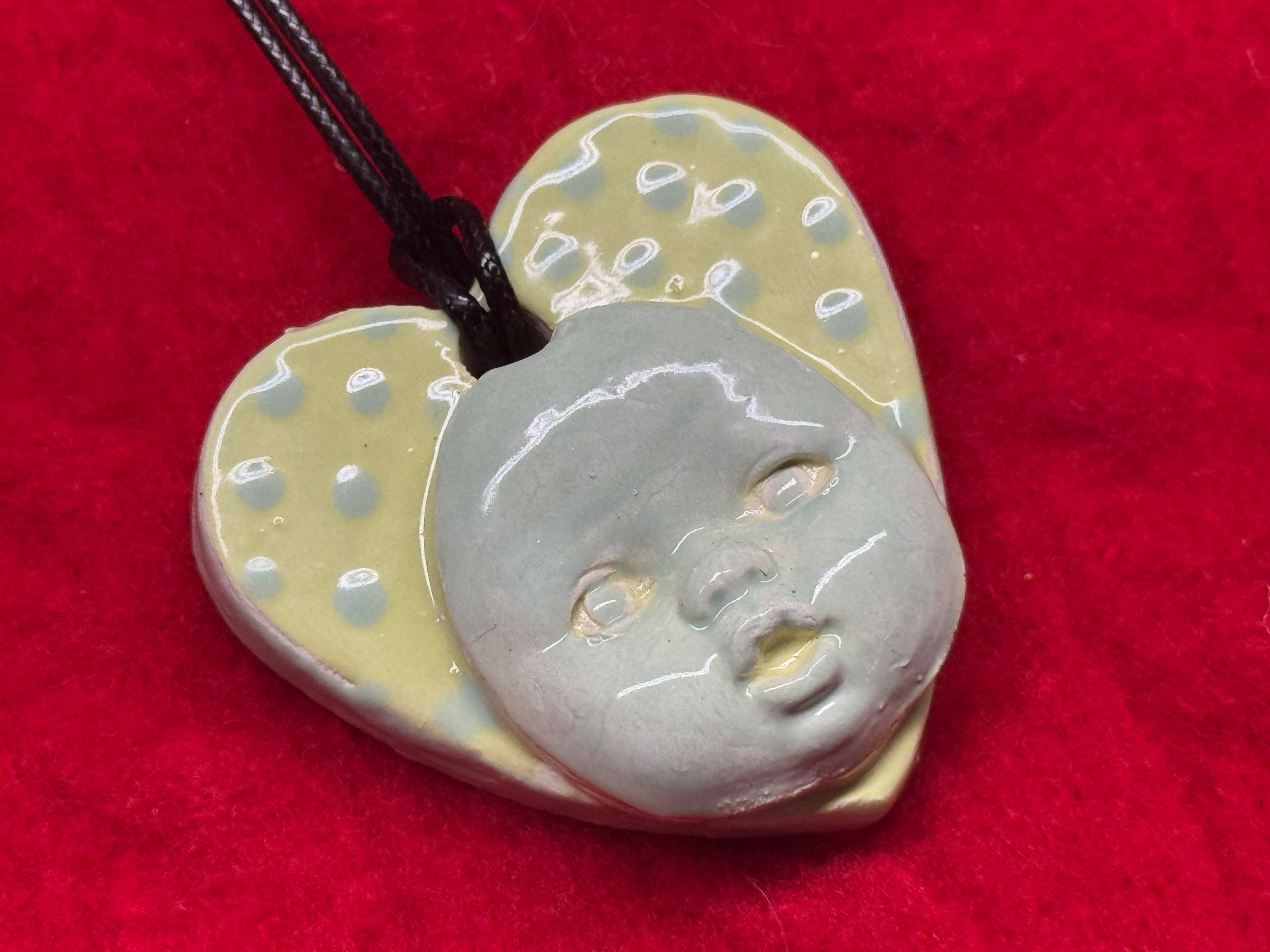 baby face necklace - pastel blue & green