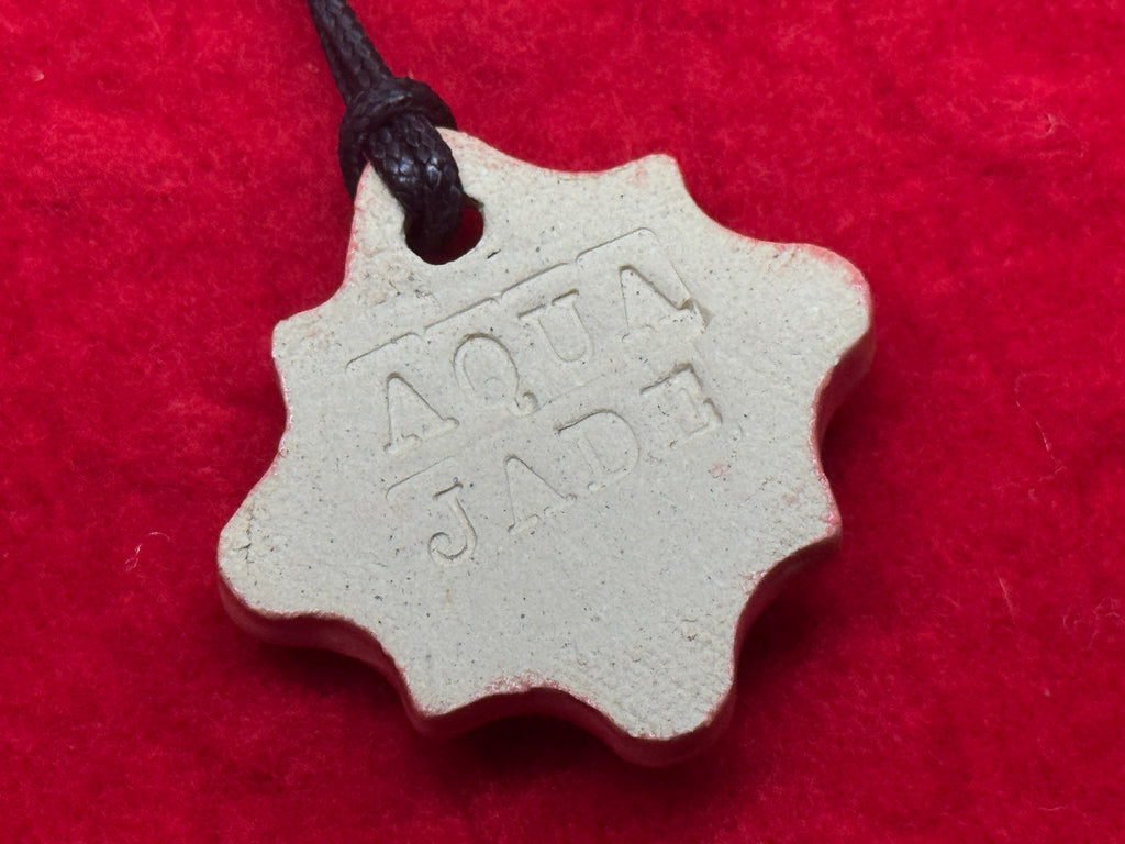 baby face necklace - coral