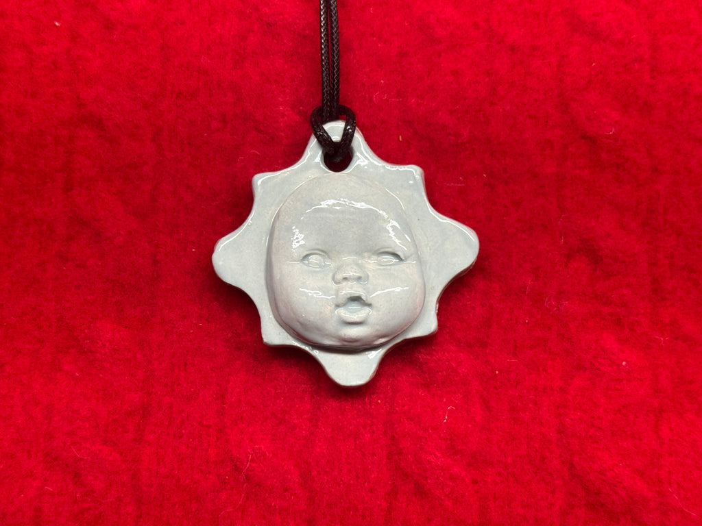baby face necklace - baby blue