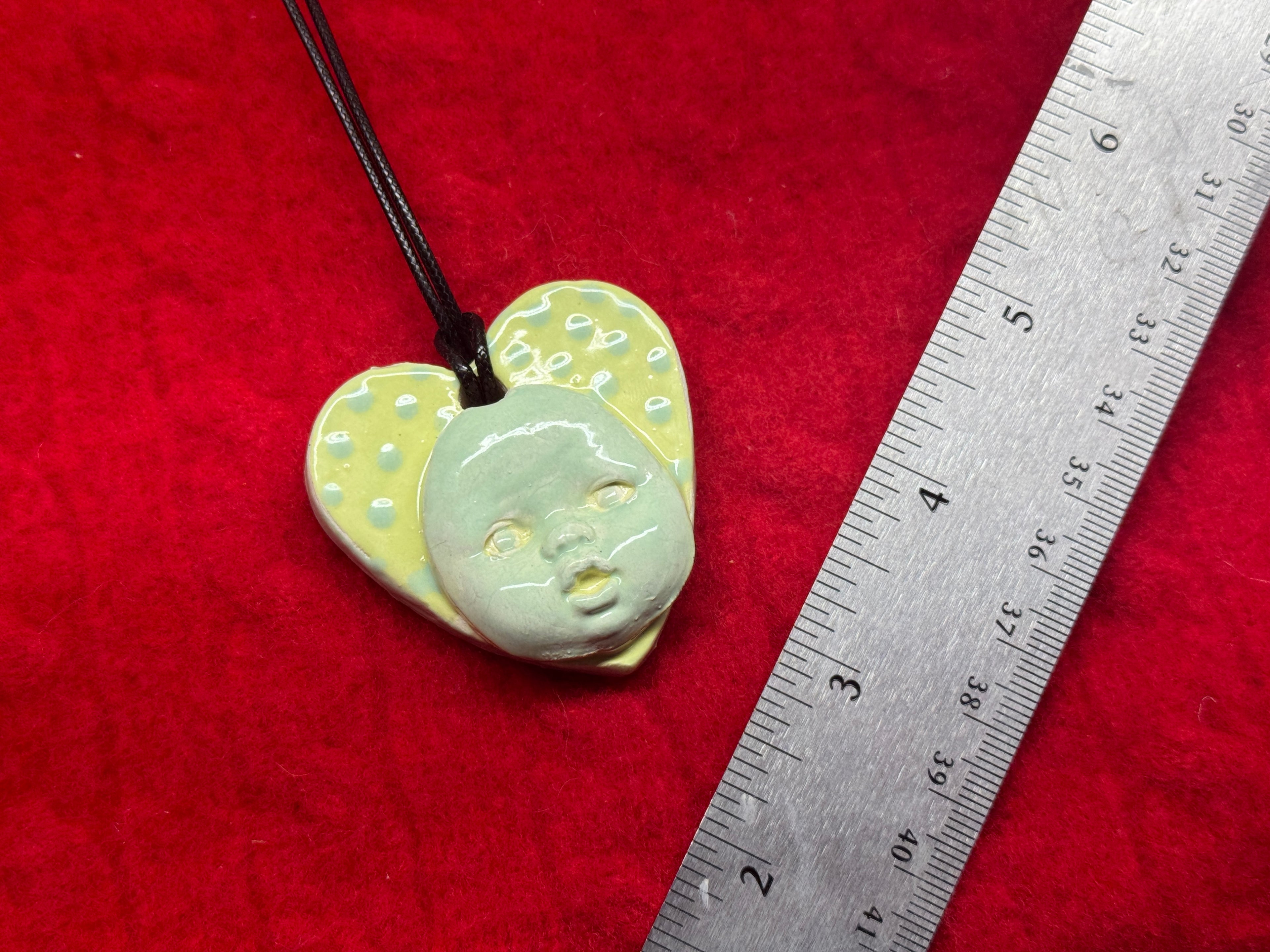 baby face necklace - pastel blue & green