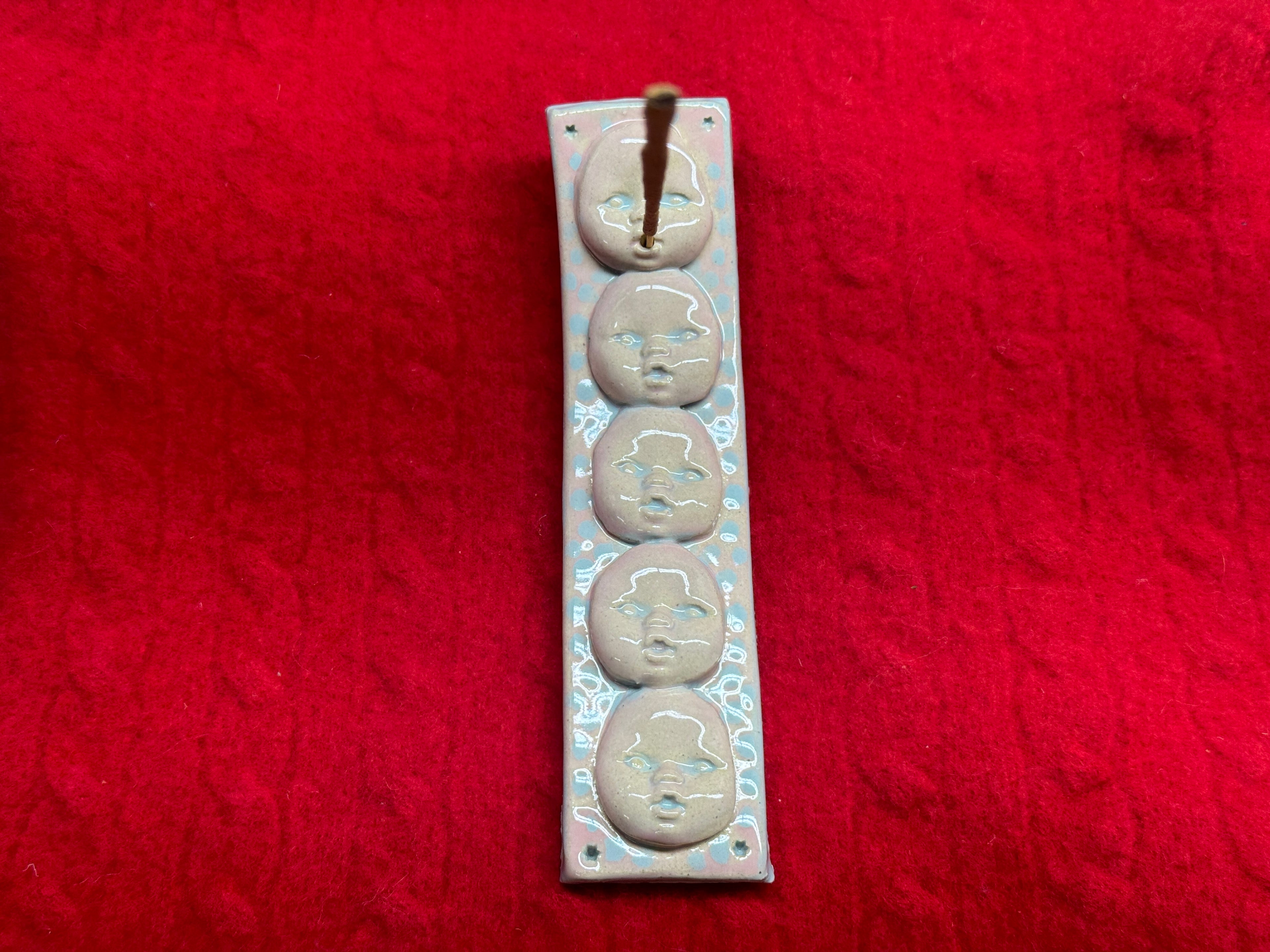 baby face incense holder - blue & pink