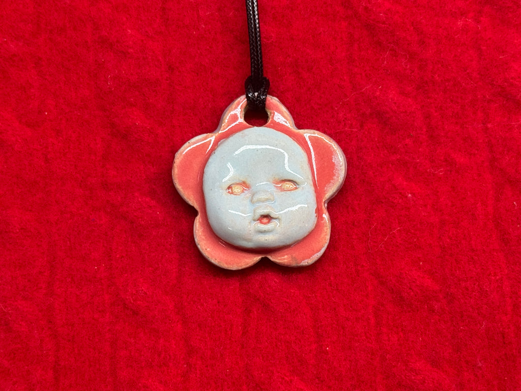 baby face necklace - blue & red