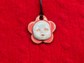 baby face necklace - blue & red