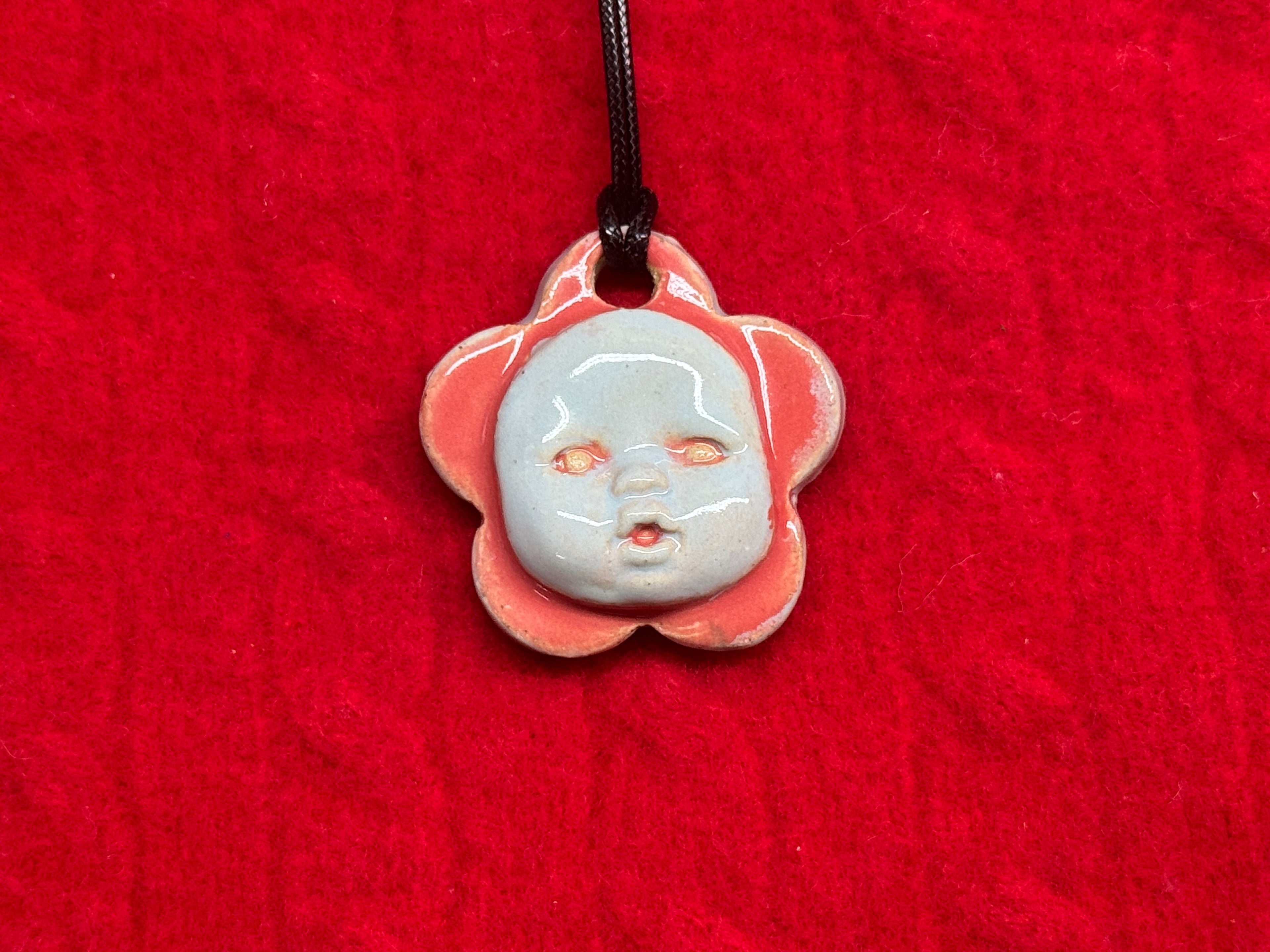 baby face necklace - blue & red