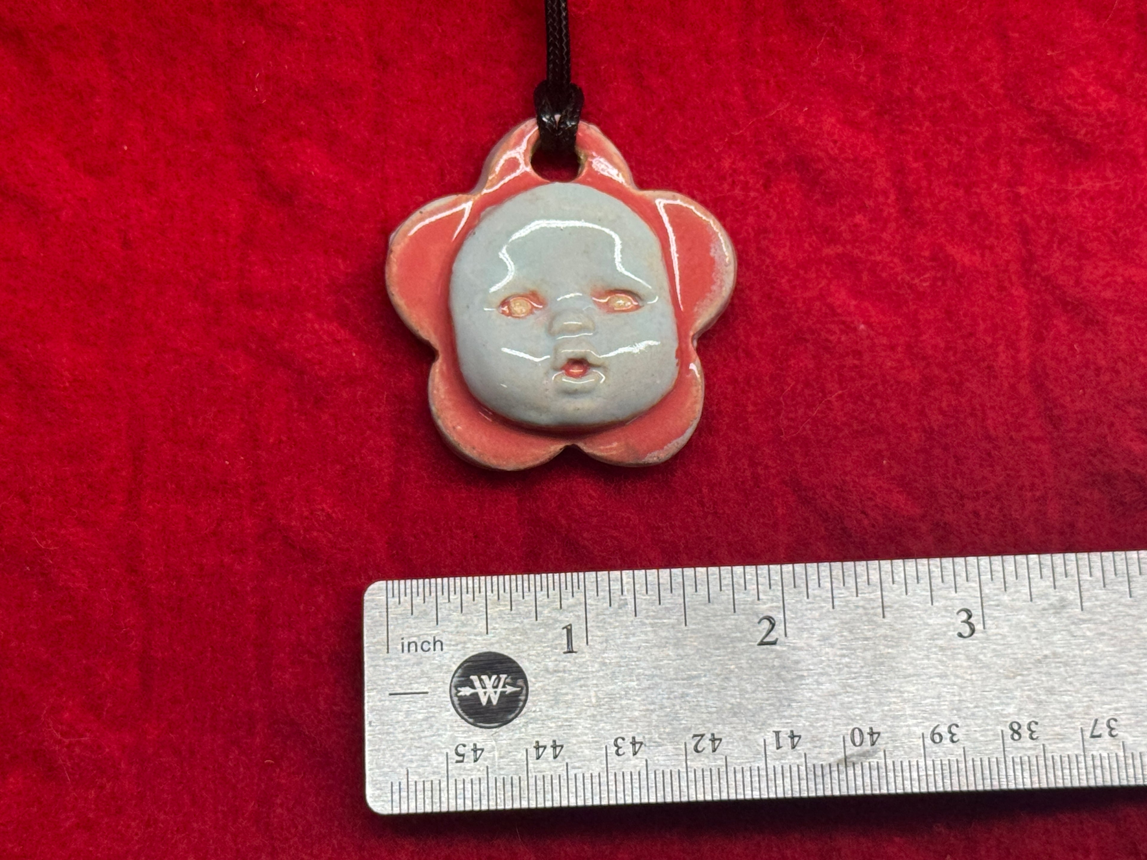 baby face necklace - blue & red
