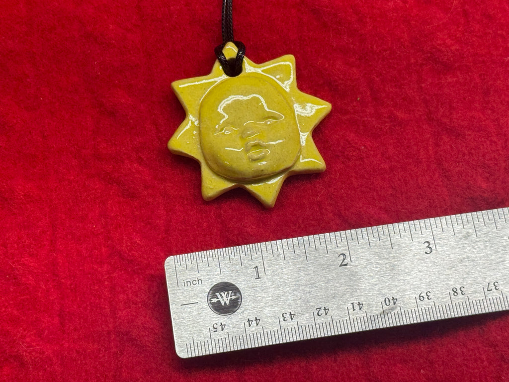baby face necklace - sun