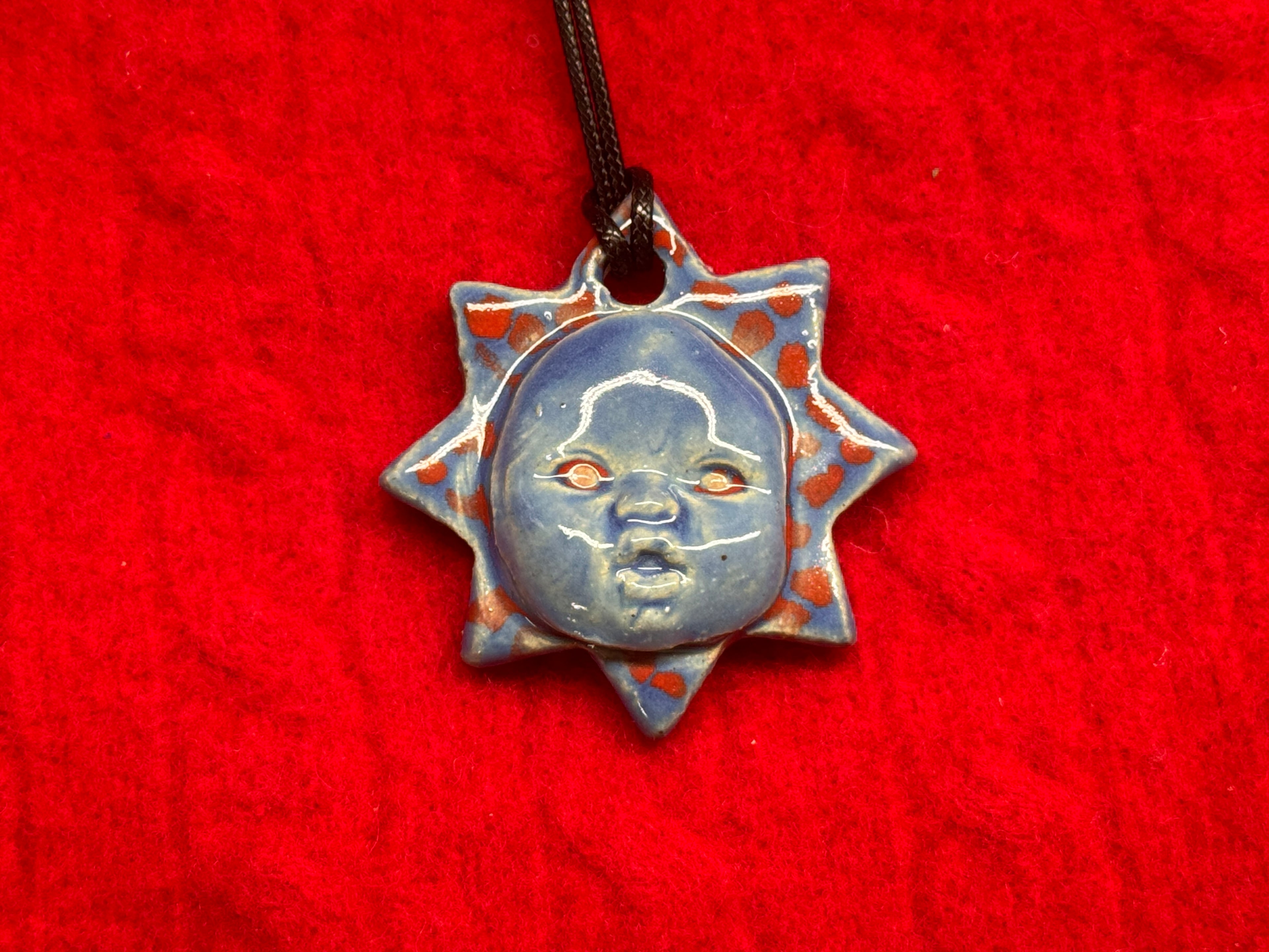 baby face necklace - blue & red