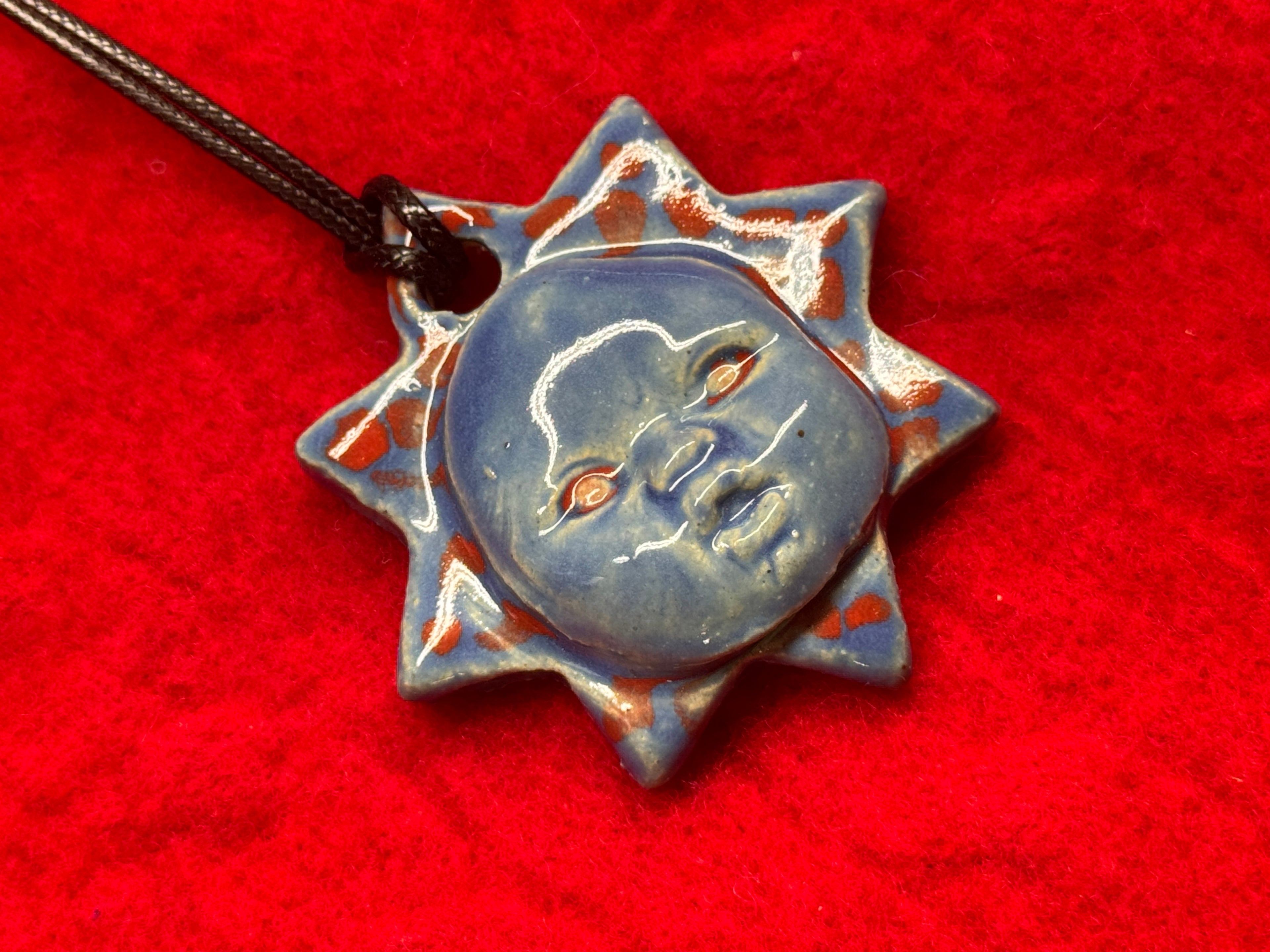 baby face necklace - blue & red
