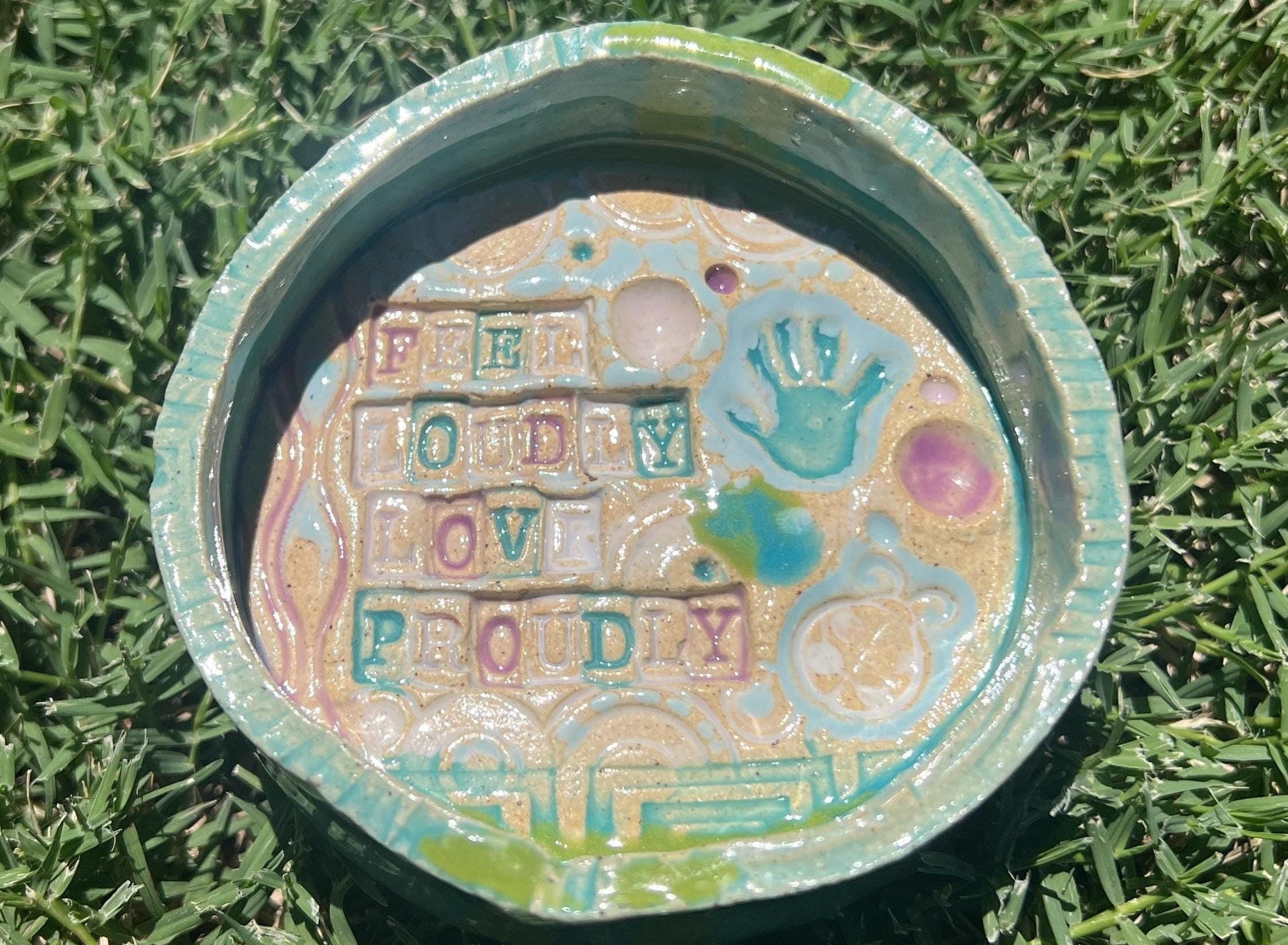 feel loudly love proudly