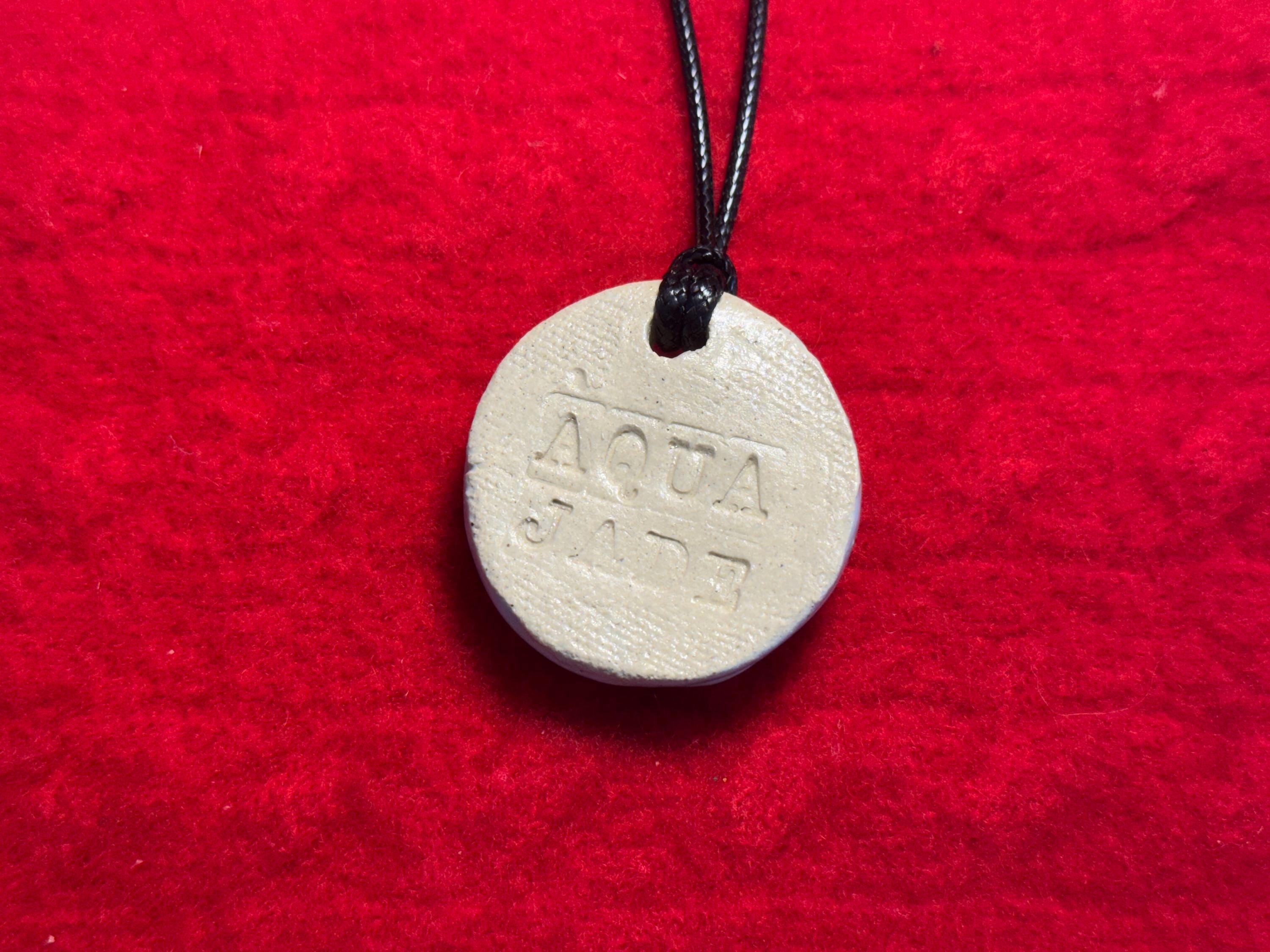 baby face necklace - baby blue